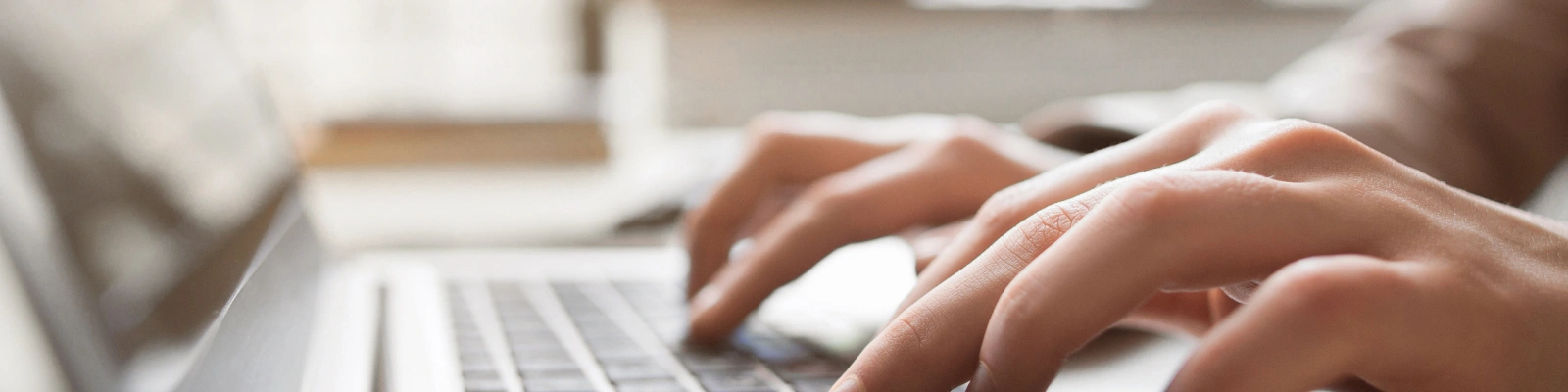 image of someone using a laptop
