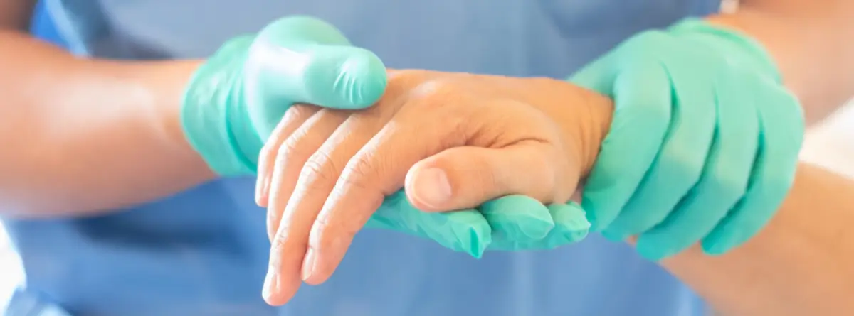 image of a surgeon doing hand surgery