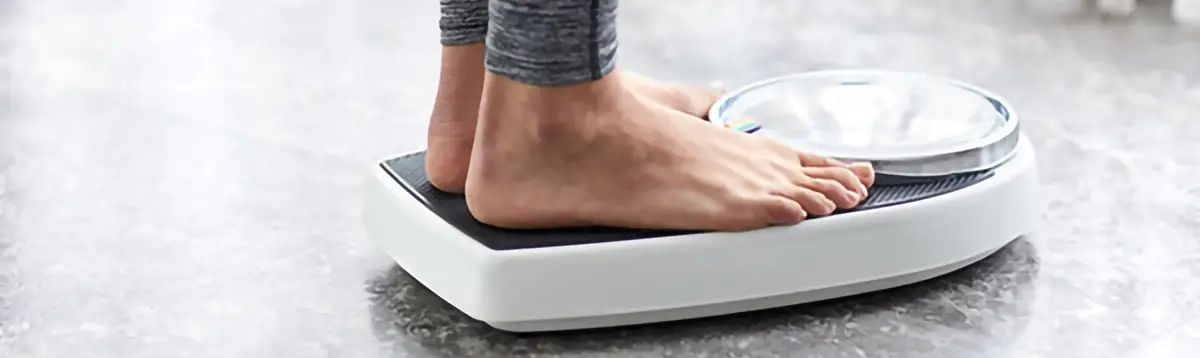 image of someone standing on scales